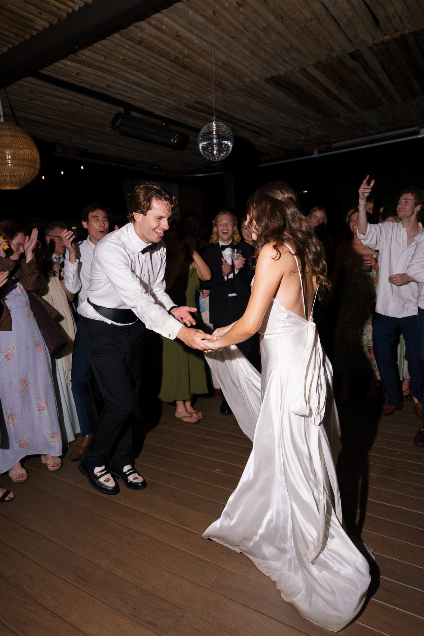 newlyweds on the dance floor, dancing for epic wedding dance floor photos. 