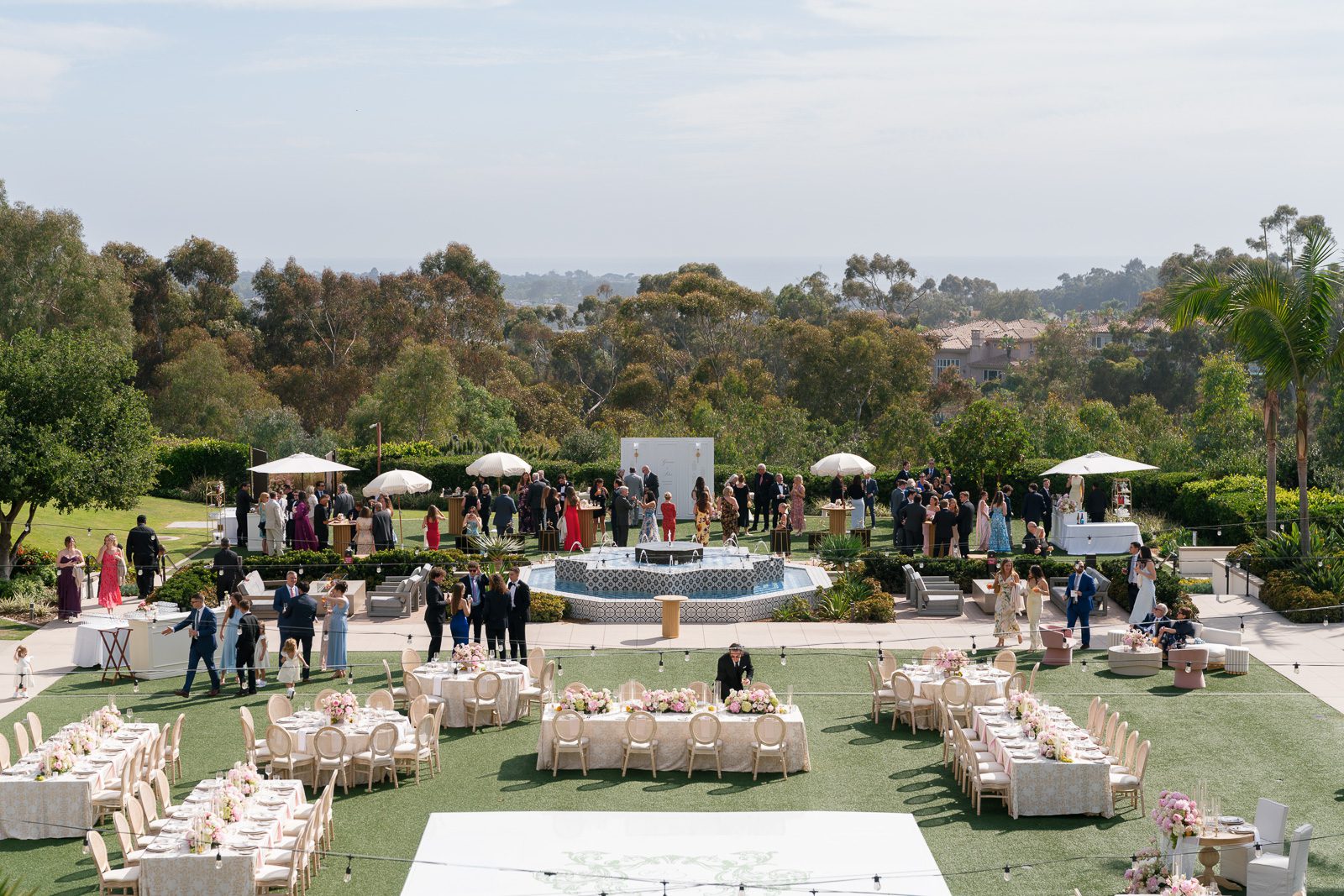 guest mingling during cocktail hour on a sunny San Diego Day
